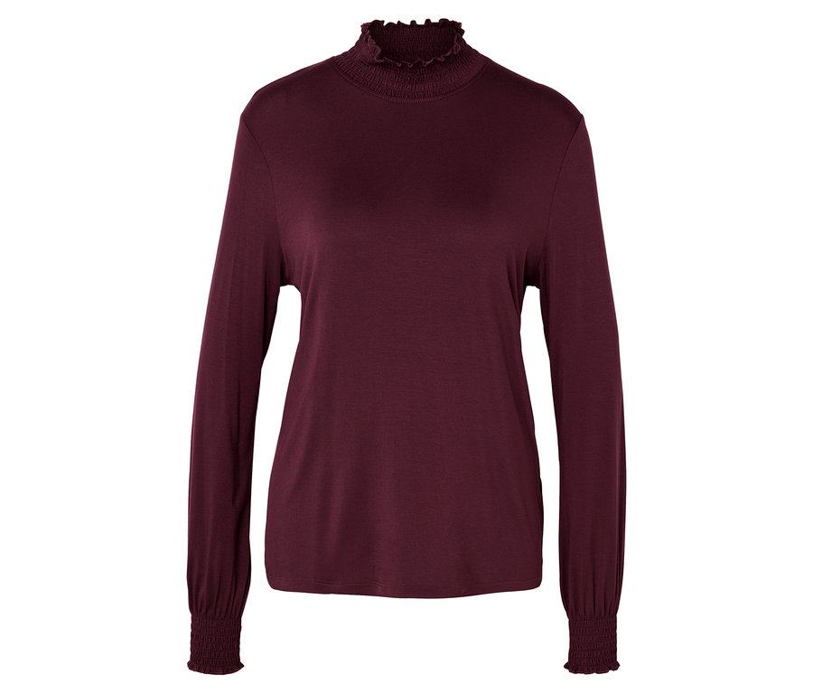 Bordó, hosszú ujjú felső fodros garbóval.