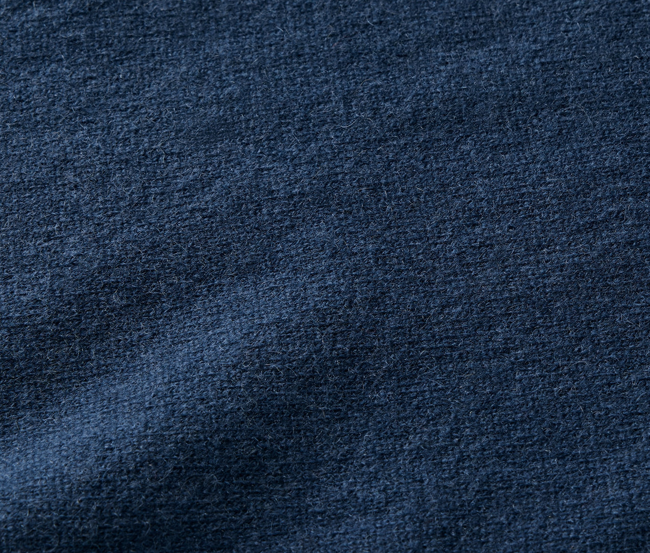 Sötétkék szövet textúrája.