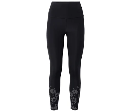 Fekete »ActivePower« sportleggings magas derékkal és szürke virágmintával a bokákon.