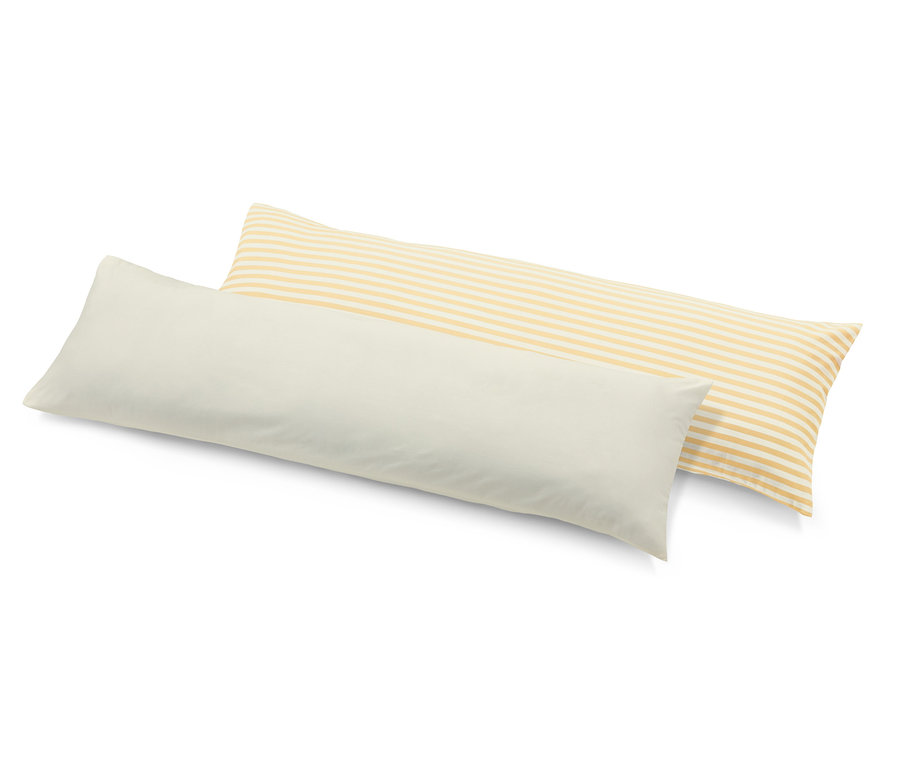 Két párnahuzat oldalt alvóknak, egy krémszínű és egy sárga csíkos.
