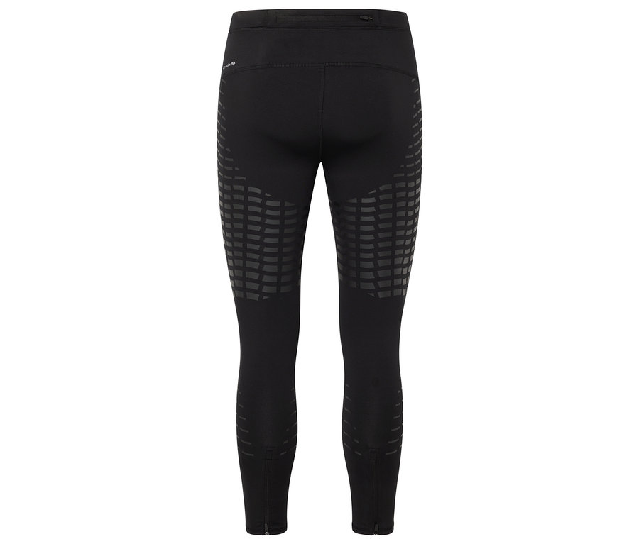 Fekete leggings hátulról, geometriai mintával a combokon és cipzárral a bokánál.