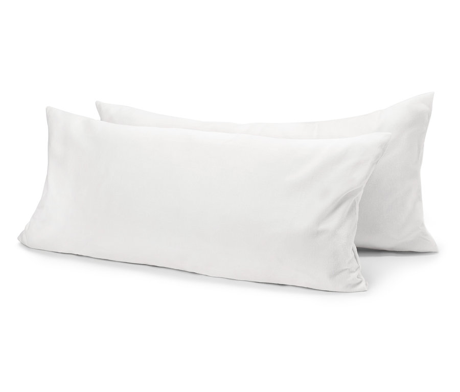 Két fehér párna egymáson fekszik.