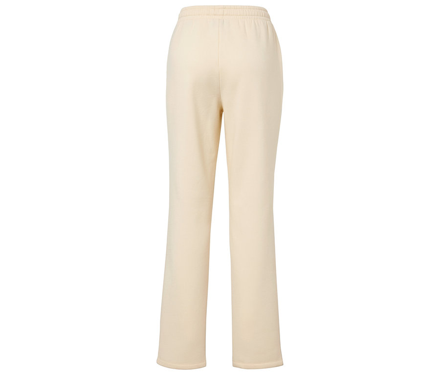 Hátulról látható bézs színű melegítőnadrág.