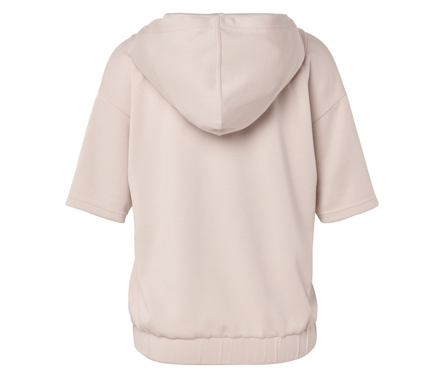 Egy bézs színű, rövid ujjú kapucnis pulóver hátulnézete.