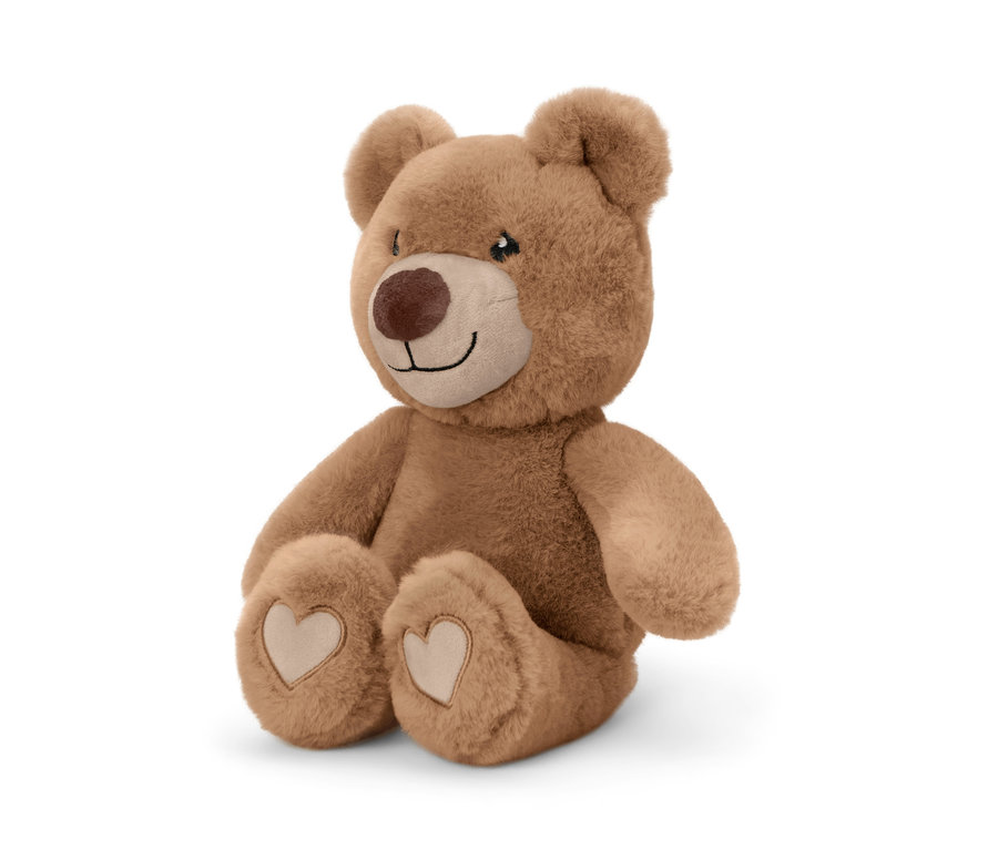 Egy ülő, barna plüssmackó.