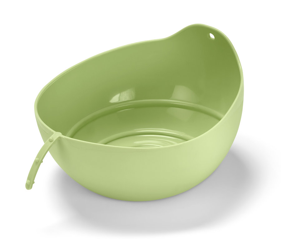 Egy zöld kenyérsütő forma.