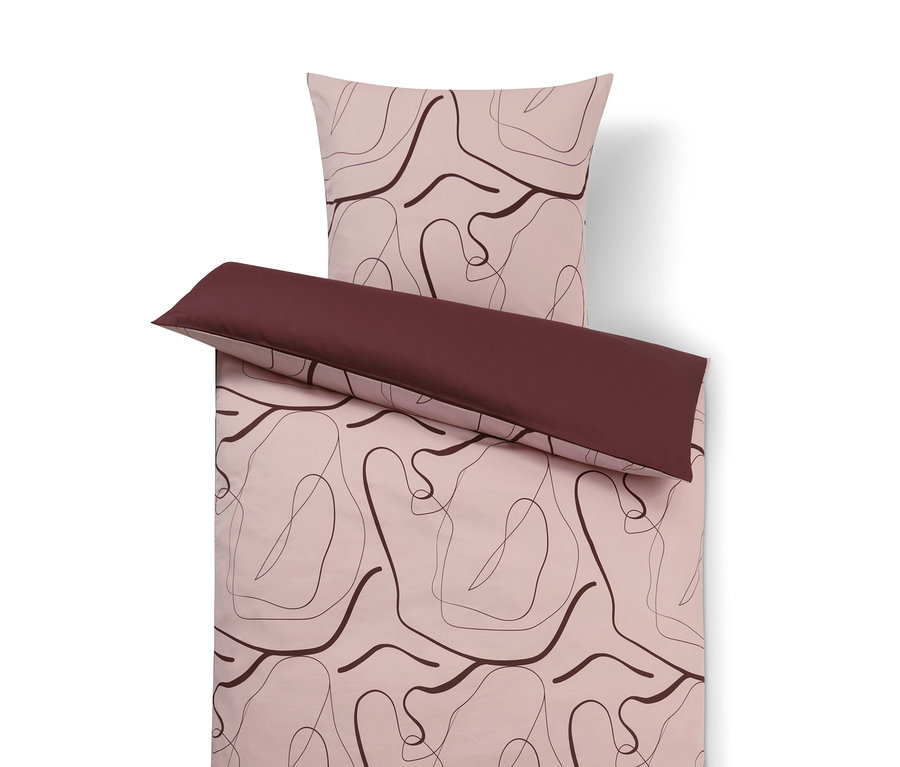 Pamut-Tencel™ágynemű mintával és bordó szegéllyel.