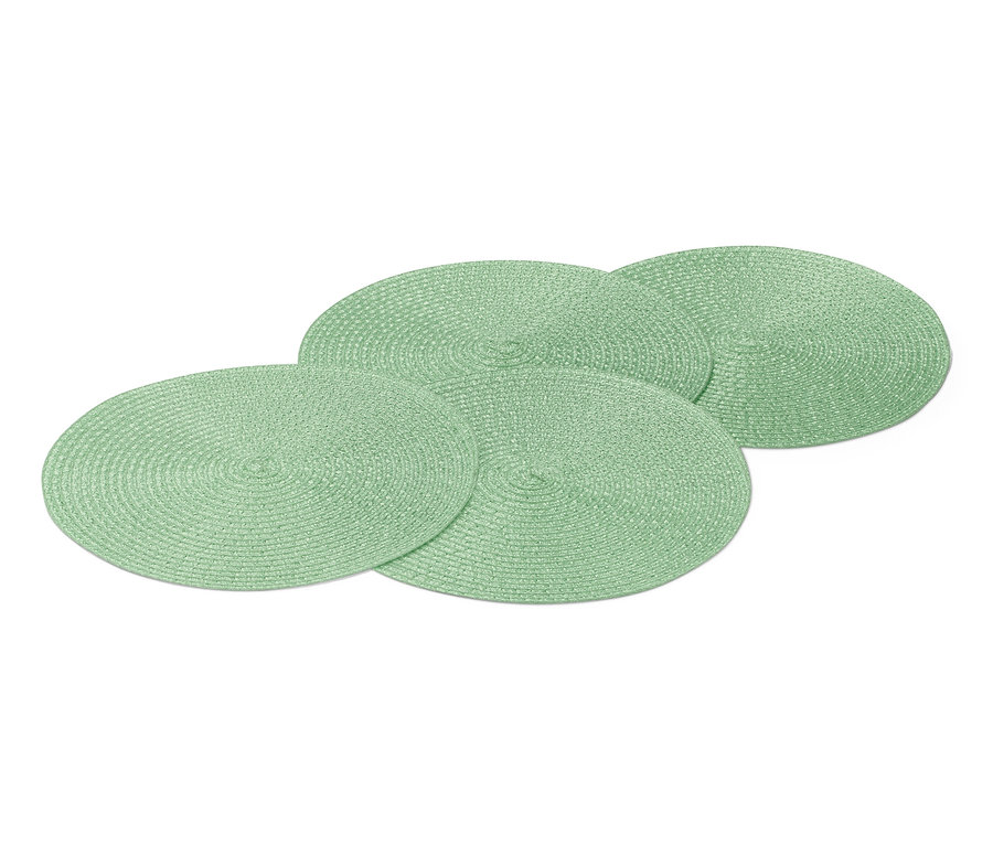 Négy zöld tányéralátét.