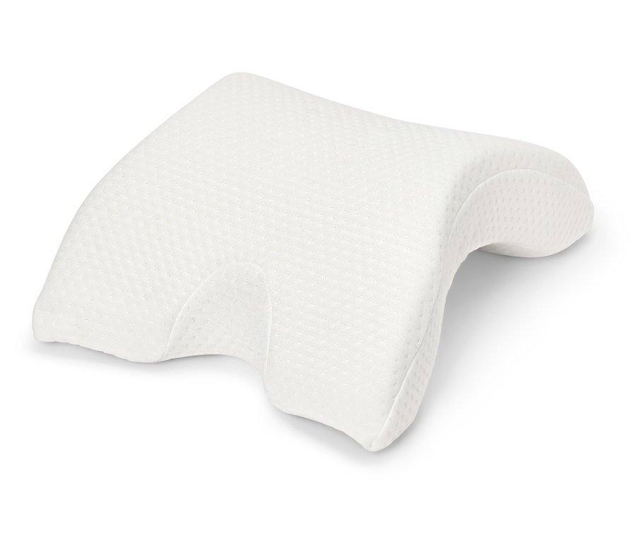 Egy fehér ortopéd párna fehér háttérrel.