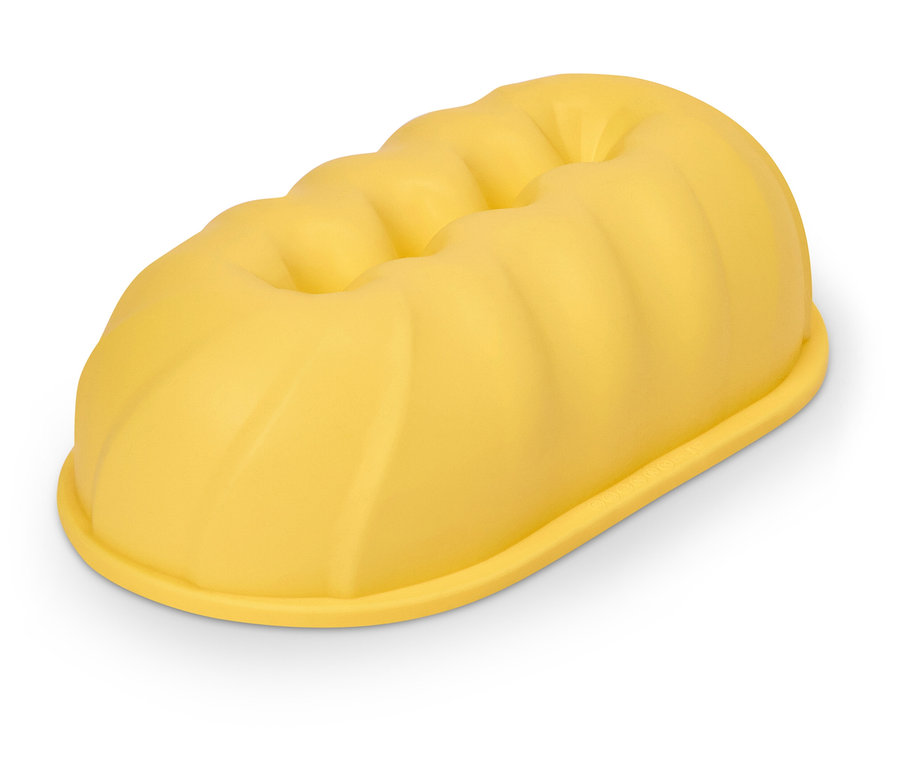 Sárga, hosszúkás, bordázott tetejű sütőforma.