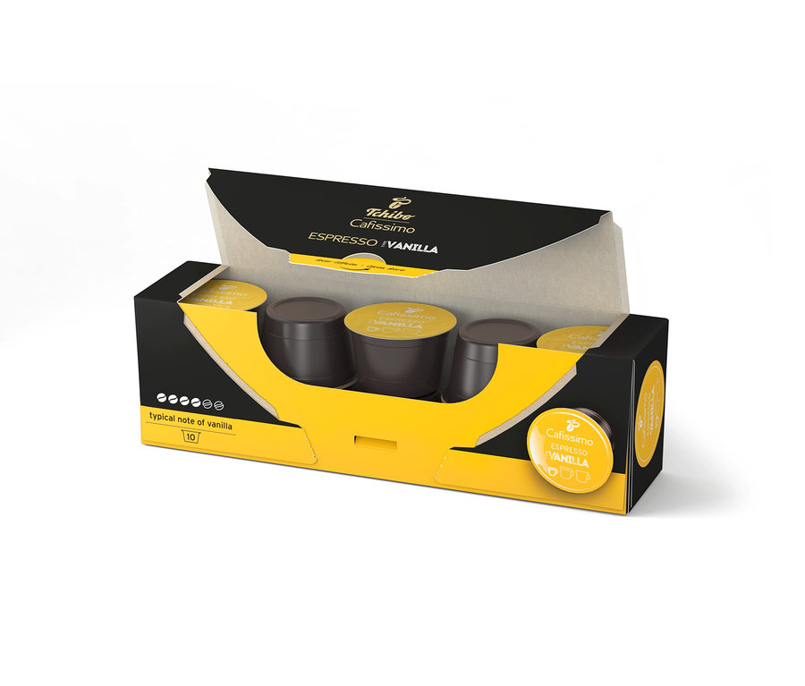 Egy nyitott, fekete és sárga csomag Cafissimo Flavoured Espresso – Vanilla – 10 db kávékapszula.