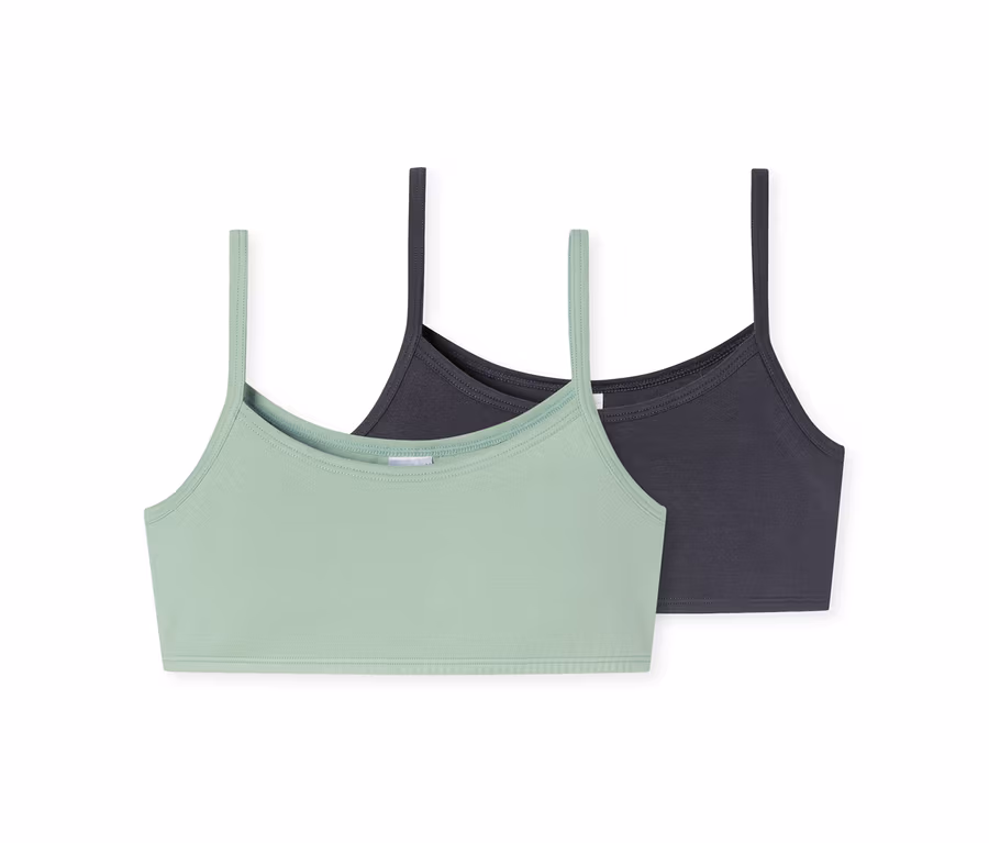Két lányka bustier, egy mentazöld és egy sötétszürke.
