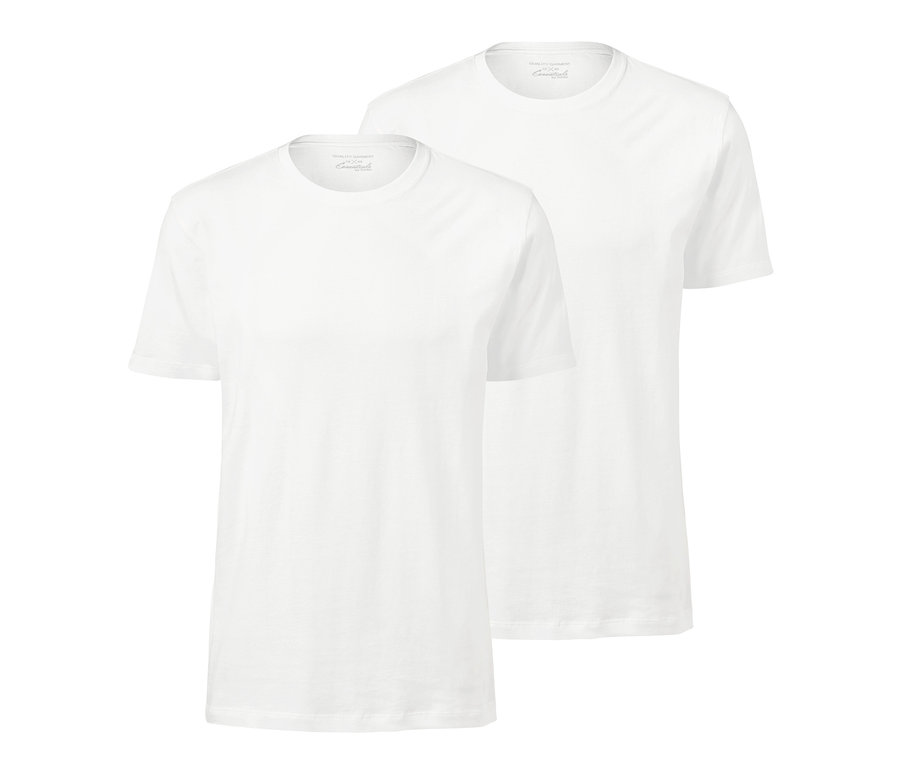 Két fehér, kerek nyakú póló.