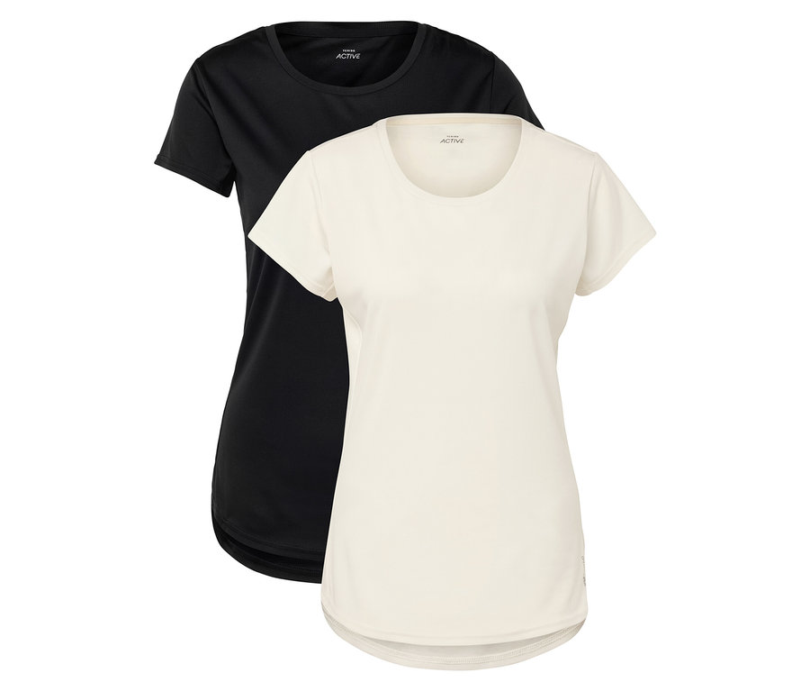 Két rövid ujjú póló, egy fekete és egy krémszínű, egymás mellett fekszik.