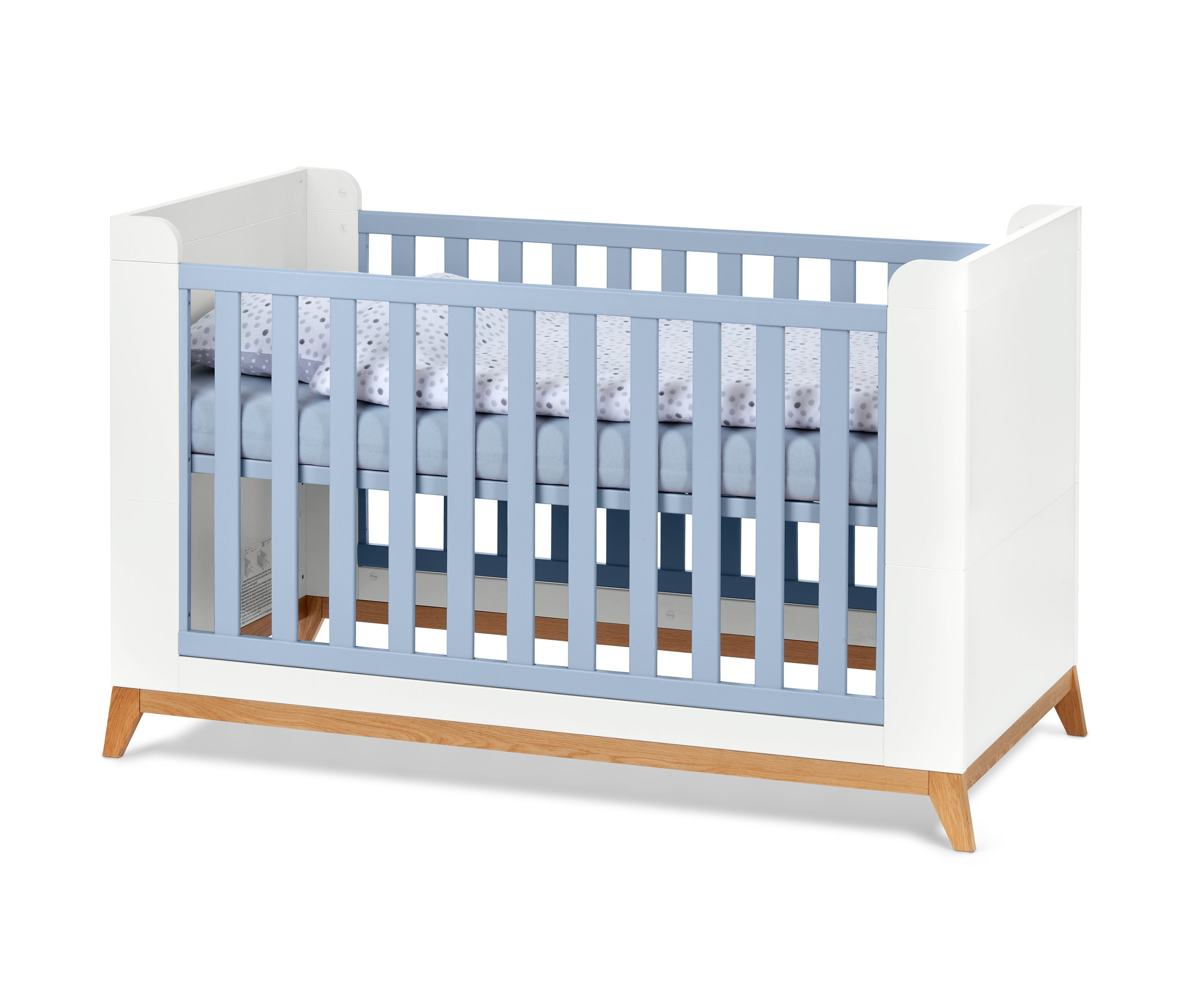 Kék rácsos gyerekágy.