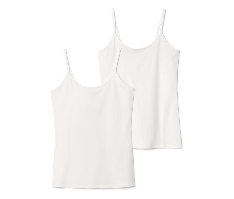 Két fehér női trikó, 2 női trikó, egymáson fekszik.