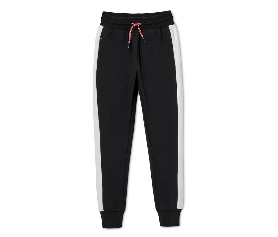 Fekete jogging alsó a 2 részes szabadidő szettből, fehér csíkkal és piros-fehér fűzővel.