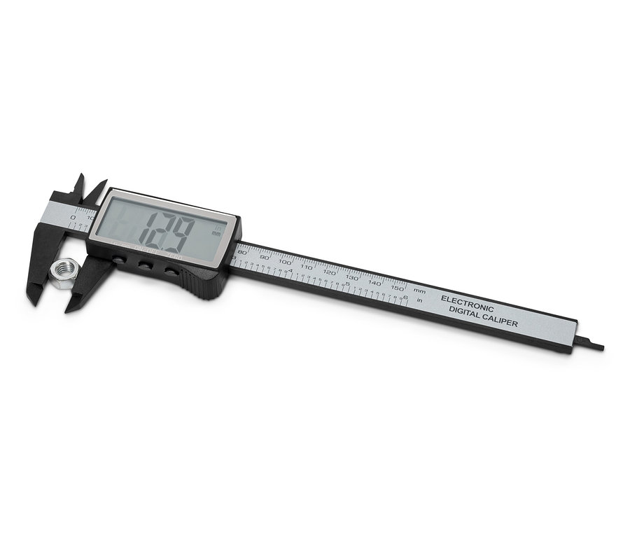 Egy digitális tolómérő egy anyát mér.