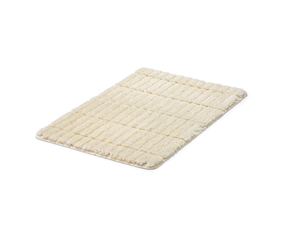 Egy törtfehér Kádkilépő, kb. 50 x 80 cm.