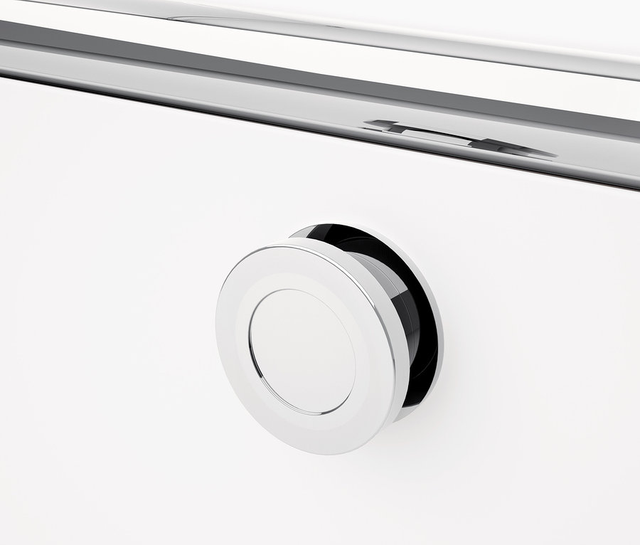 Egy fehér CN3 fémbútor részlete kerek fogantyúval.