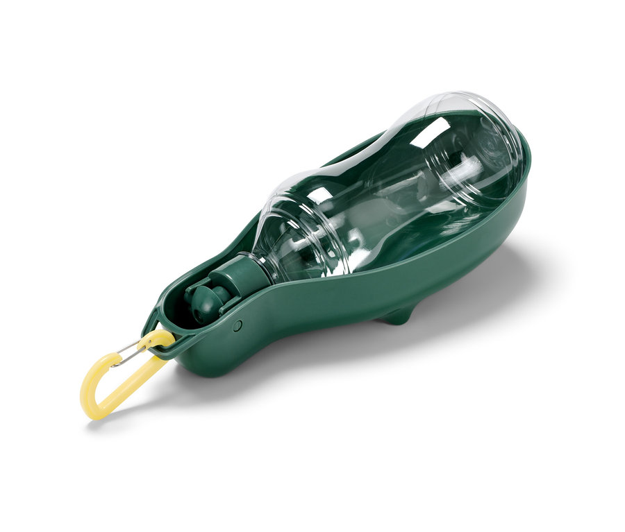 Átlátszó kutyaitató palack beépített zöld itatótálkával.