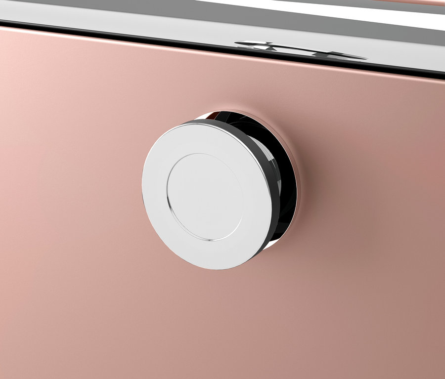 Egy rózsaszín készülék részlete króm gombbal.