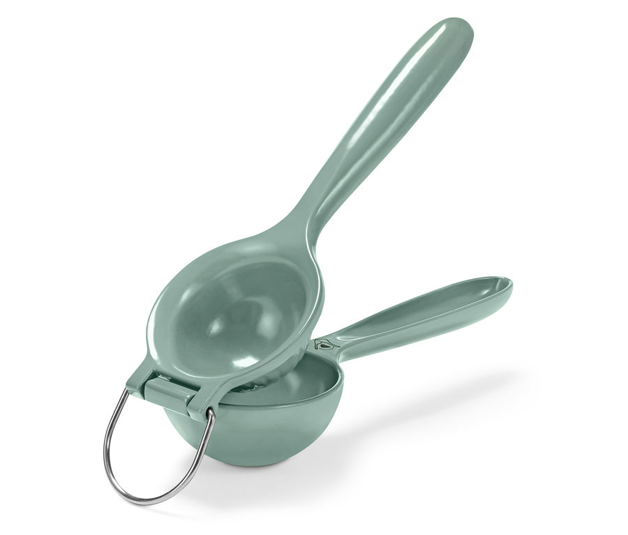 Zöld citrusprés ezüst fogantyúval.