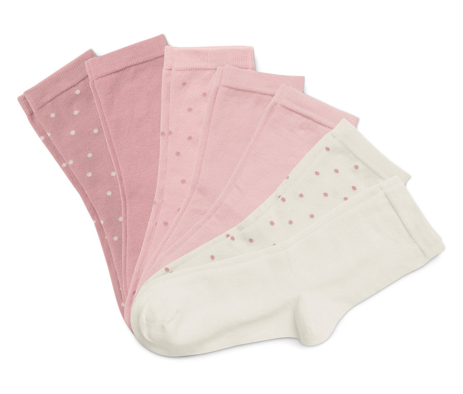 Öt zokni legyezőszerűen elrendezve fehér háttéren. A zoknik rózsaszínűek és fehérek, pöttyös mintával.