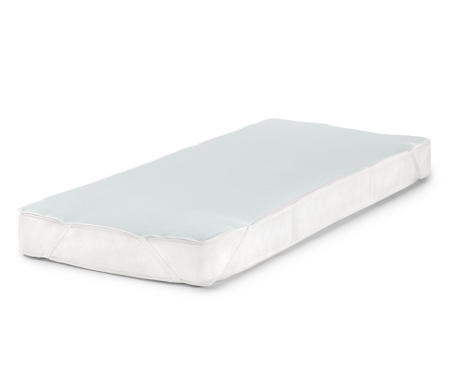 Egy matracvédő van egy matracon.