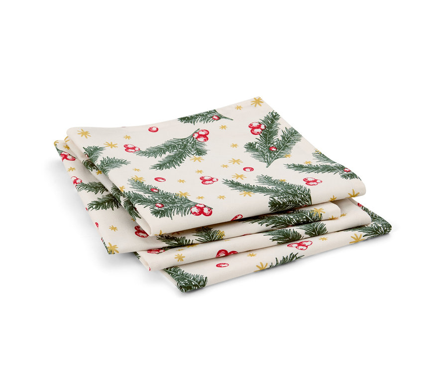 Négy darabos szalvéta szett. A szalvéták zöld ágakkal, piros bogyókkal és arany csillagokkal vannak nyomtatva.