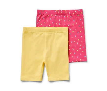 Két kerékpáros leggings gyerekeknek, egy rózsaszín és egy sárga.