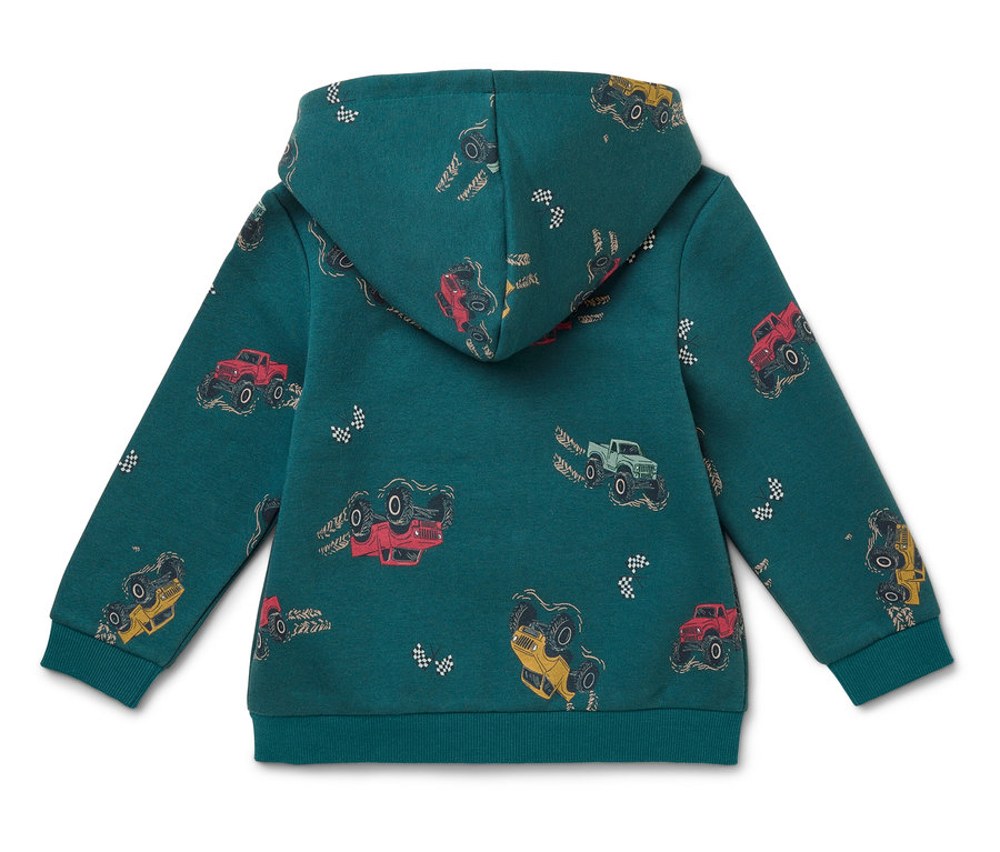 Hátulnézet egy zöld, monster truck mintás kapucnis pulóverről.