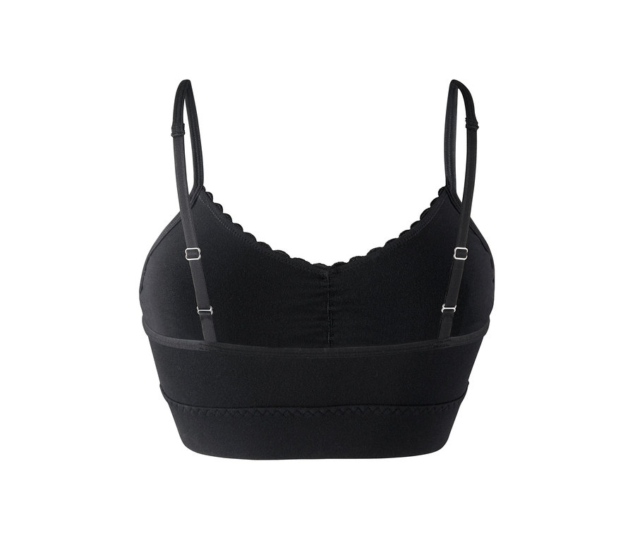 Egy fekete női bustier melltartó részlete hátulnézetből.