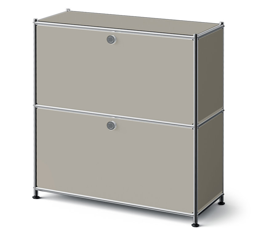 Kétszintes szekrény bézs fiókokkal és ezüst kerettel.