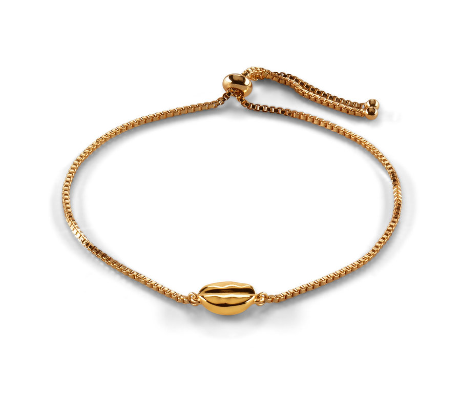 Aranyozott női karkötő, kávébab alakú, fehér alapon.