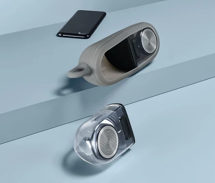 Két mágneses Bluetooth hangszóró és egy telefon kék háttérrel.