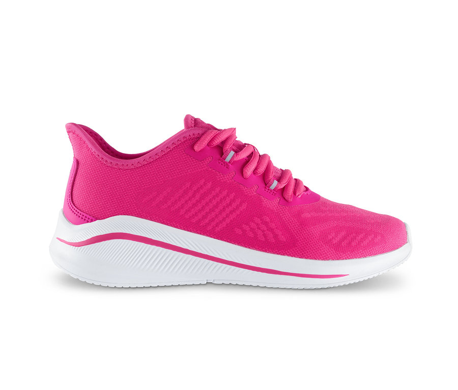 Egy rózsaszín sneaker fehér talppal.