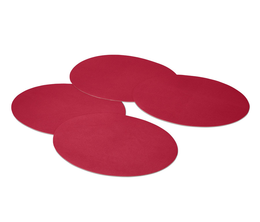 Négy piros, kétoldalas tányéralátét egymáson.
