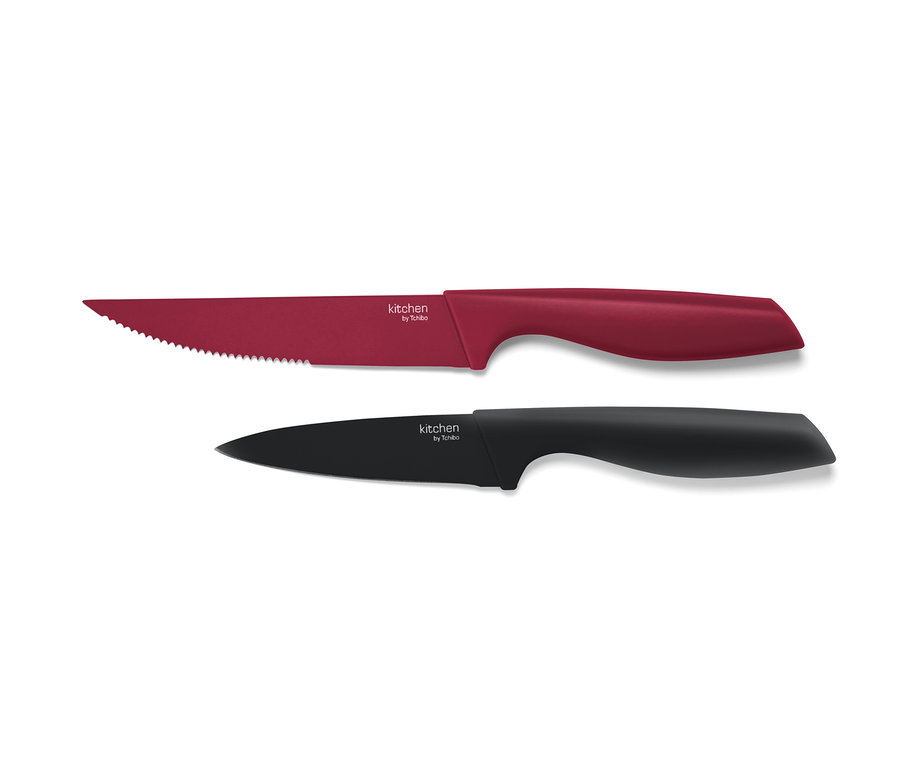 Két darabos konyhai késkészlet: egy piros, fogazott pengéjű és egy fekete.
