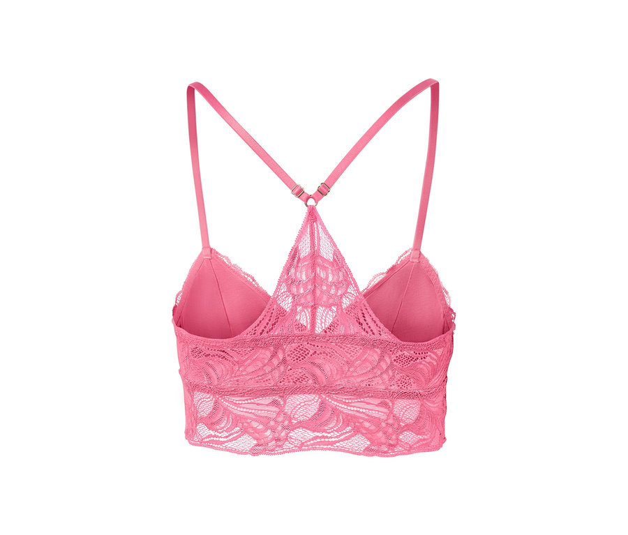 Egy rózsaszín csipkés bustier melltartó részletfotója.