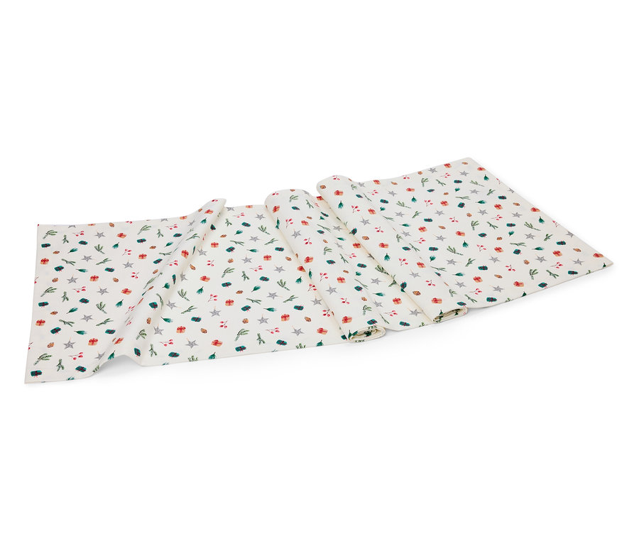 Fehér asztali futó csillag, ajándék és ág mintával.