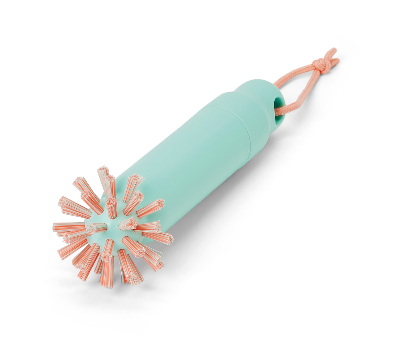 Egy 2 az 1-ben lefolyótisztító kefe mentazöld nyéllel és rózsaszín sörtékkel.