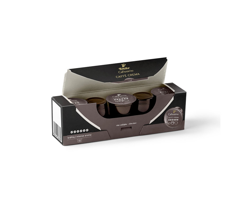 Három sötétbarna kapszulát tartalmazó, nyitott Tchibo Cafissimo Caffè Crema Intense - 10 db kávékapszula doboz.