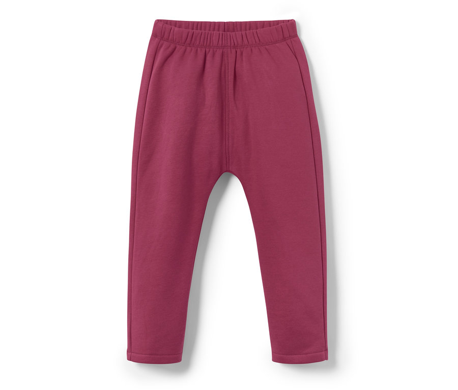 Lila kisgyerek tréningnadrág, szivárványos, fehér háttérrel.