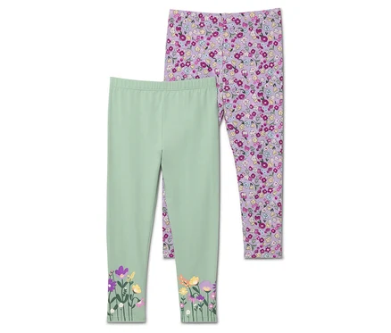 Két leggings: az egyik világoszöld, alján virágokkal, a másik lila, teljes felületén virágmintával.