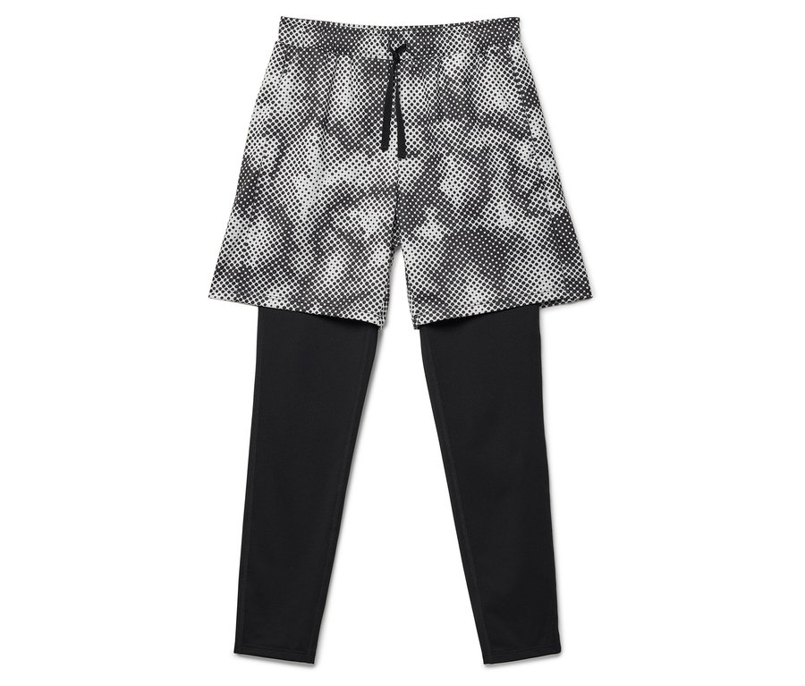 Fekete leggings pöttyös rövidnadrággal a tetején.