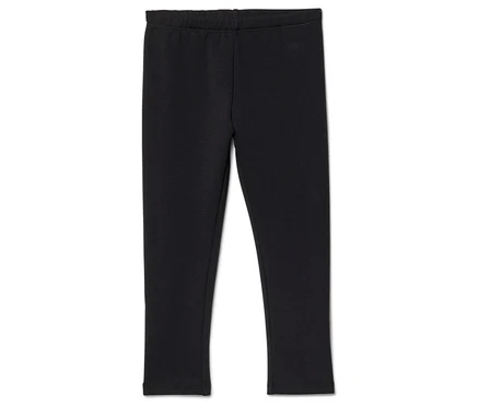 Fekete, gumis derekú leggings fekszik fehér háttéren.