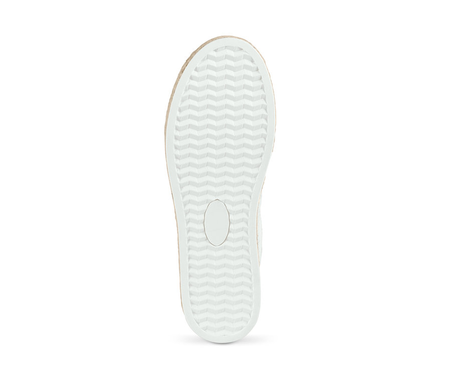 Egy vászon sneaker cipő talpának részlete.