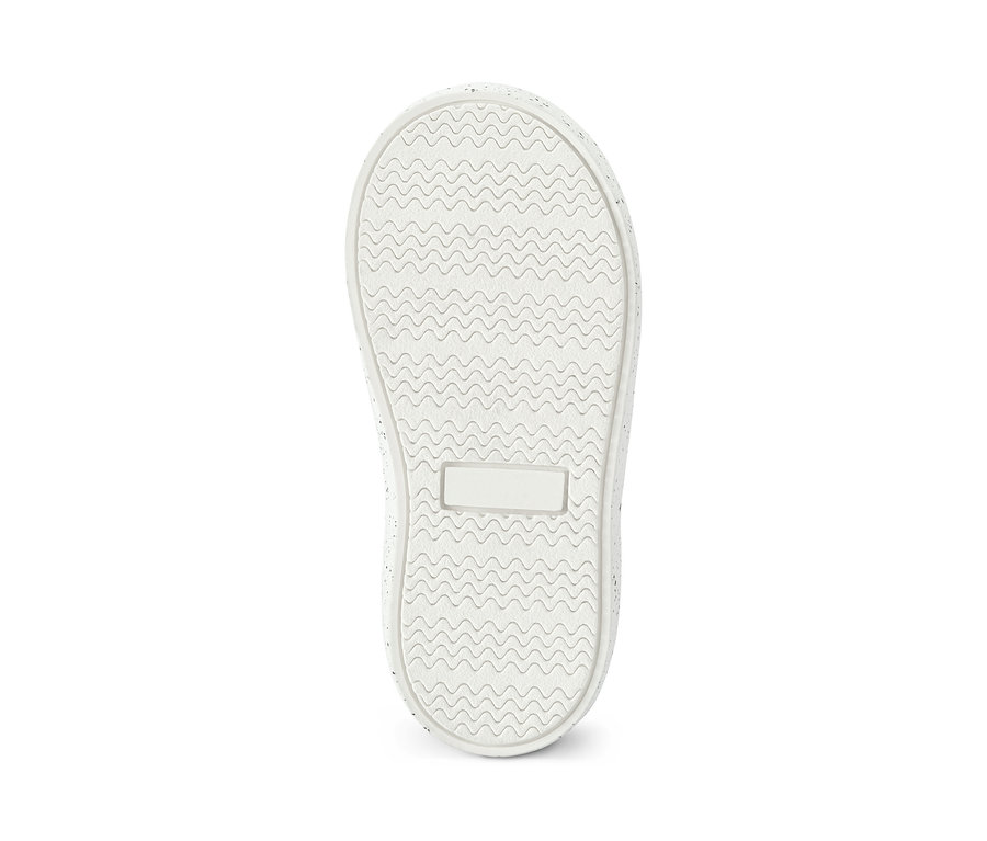 Egy sneaker cipő hullámos mintázatú talpa.