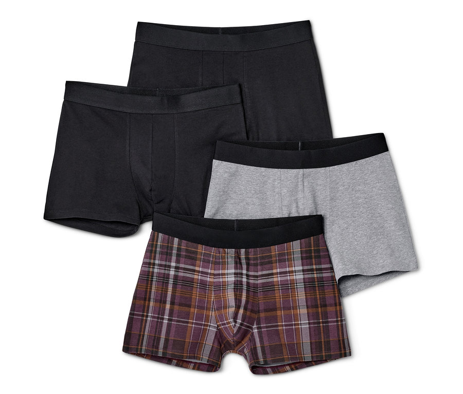 Négy férfi boxer alsónadrág: kettő fekete, egy szürke és egy kockás.